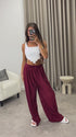Chrissy Wine Plisse High Waisted Wide Leg Satin Trousers